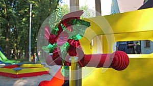 A Toy Windmill Spinning Outdoors