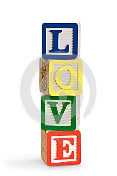 Toy wooden blocks stack with word love , tower of
