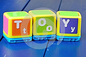 Toy word on a wood table