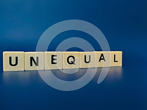 Toy word with the word UNEQUAL