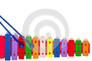 Toy xylophone on white