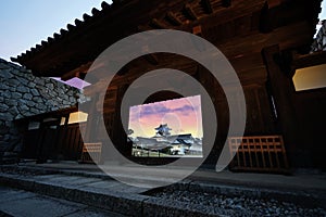 Toyama Castle and the evening sky, view through the entrance to the castle in Toyama.