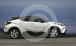 Toyota C-HR white car.