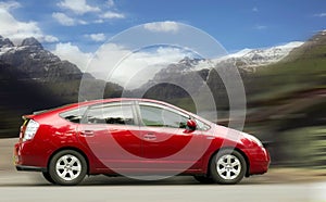 Toyota Prius Hybrid is a red car. photo