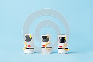 Toys astronaut on blue background with copy space for text. Concept of business launch, start up, handcraft, diy, creative idea