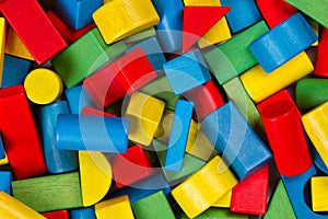Toys blocks, multicolor wooden building bricks, heap of colorful