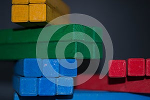 Toys blocks, multicolor wooden building bricks, heap of colorful