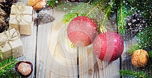 Toys for the Christmas tree and pine cones on old wooden background new Year