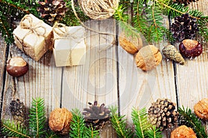 Toys for the Christmas tree and pine cones on old wooden background new Year