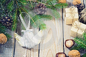 Toys for the Christmas tree and pine cones on old wooden background new Year