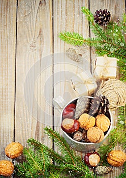 Toys for the Christmas tree and pine cones on old wooden background new Year