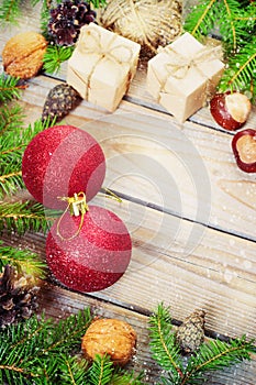 Toys for the Christmas tree and pine cones on old wooden background new Year