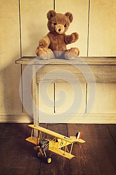 Toys on wooden bench with vintage look