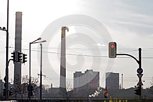 TPP thermal power plant on a sunrise. Refinery with smokestacks. Smoke from factory pollutes the environment