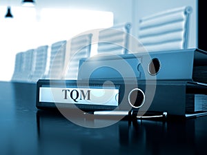 TQM on File Folder. Toned Image. 3D.