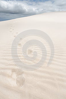 Trace of footprints in the sand