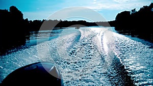 Trace of motor boat on the water