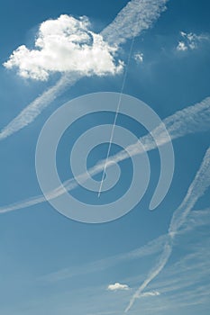 Traces of planes and clouds in the sky