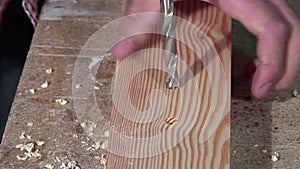 Tracing and drilling of a wooden board