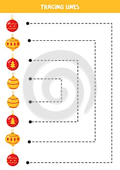 Tracing lines for kids. Cartoon Christmas baubles. Writing practice