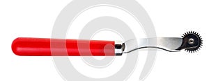 Tracing wheel with red plastic handle