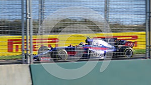 Carlos Sainz Jr. driving a F1 racing car of scuderia Toro Rosso at Albert Park circuit