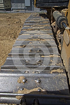 Track of dozer with dirt