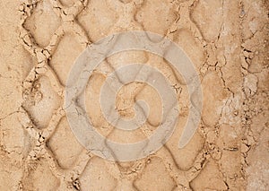 Track from the tread of a wheel of a truck and construction equipment, close-up, background