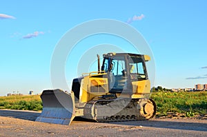 Track-type bulldozer, earth-moving equipment.