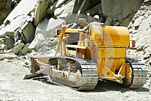 Track-type loader bulldozer excavator at road work