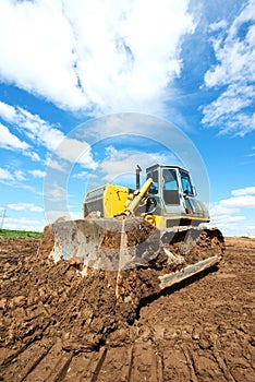 Track-type loader bulldozer excavator at work