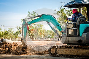 Track-type loader excavator machine on construction site