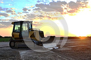 Track-type tractors, bulldozer, earth-moving equipment.