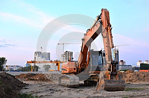 Tracked excavator working at a construction site