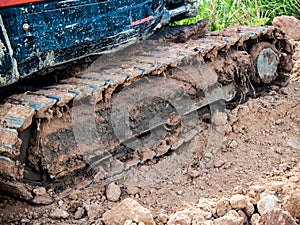 Tracked vehicle working in farm