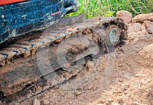 Tracked vehicle working in farm