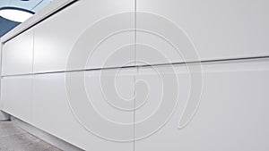 Tracking shot of a luxury kitchen with white modern design