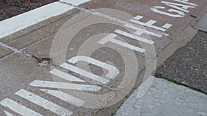 tracking shot of mind the gap sign