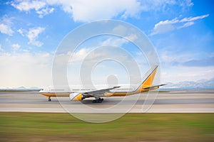 Tracking shot for taxiing airplane along the runway photo