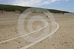 Tracks off car on beach