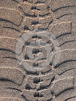 Tracks,wheel prints in sand at beach from horse-drawn carriages, jeeps and quad bikes