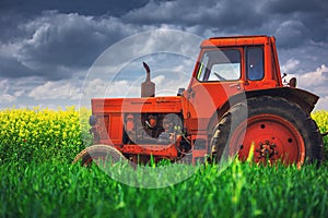 Tractor in the agricultural fields
