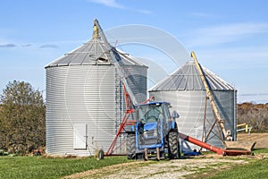 Tractor, Auger, and Grain Bins