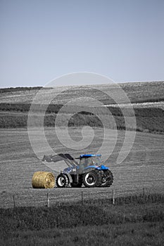Tractor with Bail of Hay