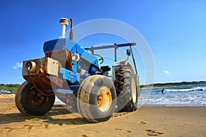 Tractor on beach photo