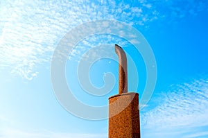 Tractor chimney on blue sky background