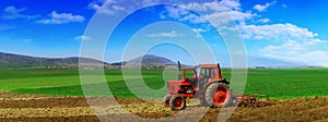 Tractor cultivating photo