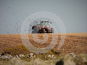 Tractor driving across the field