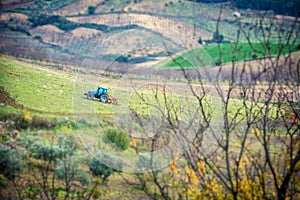 Tractor on farm landscape