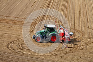 Green tractor in a field